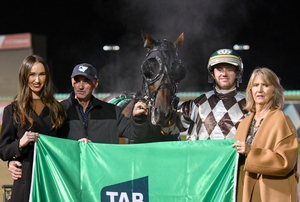 David Hewitt pictured with daughter Jessica, son Brad and wife Maree following a success with their pacer Extreme Sea.